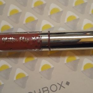 Ciate glitter flip lip gloss in INFAMOUS